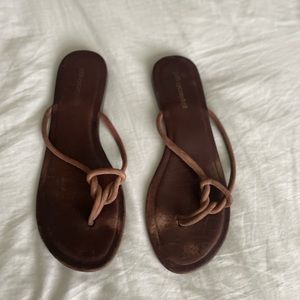 Tan leather slide sandal.